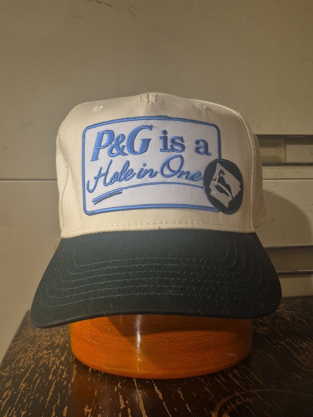 "P&G Is a Hole in One" Trucker Hat